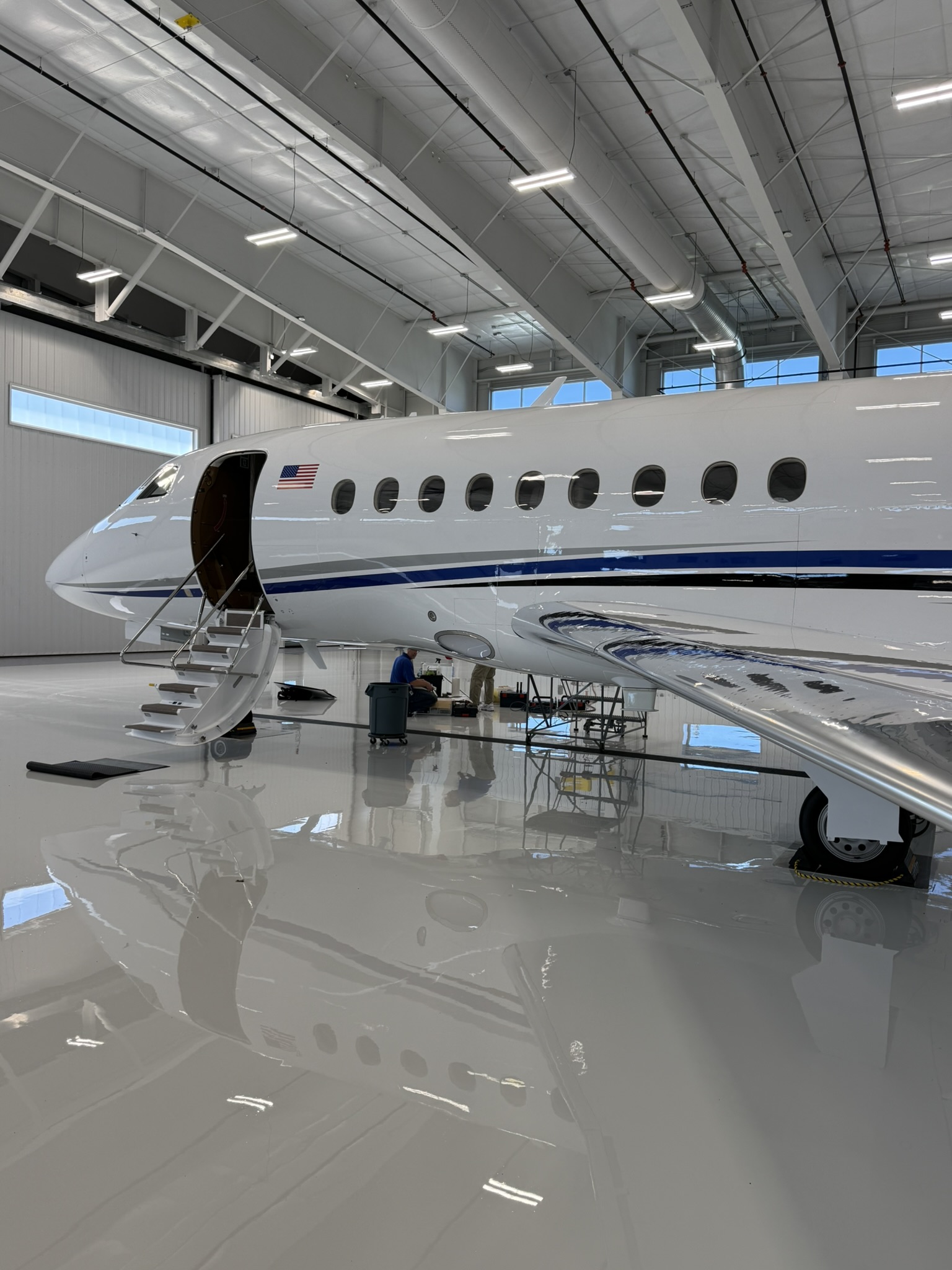 Falcon jet in the NewView hangar